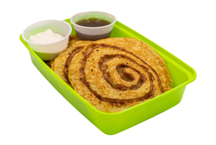 Two slices of Whole Grain & Seed Bread marinated in Vanilla Cinnamon Protein French Toast Batter. Two slices of Turkey Bacon and No Sugar Added Syrup | Breakfast meal prep delivered, meal prep services, meal prep companies