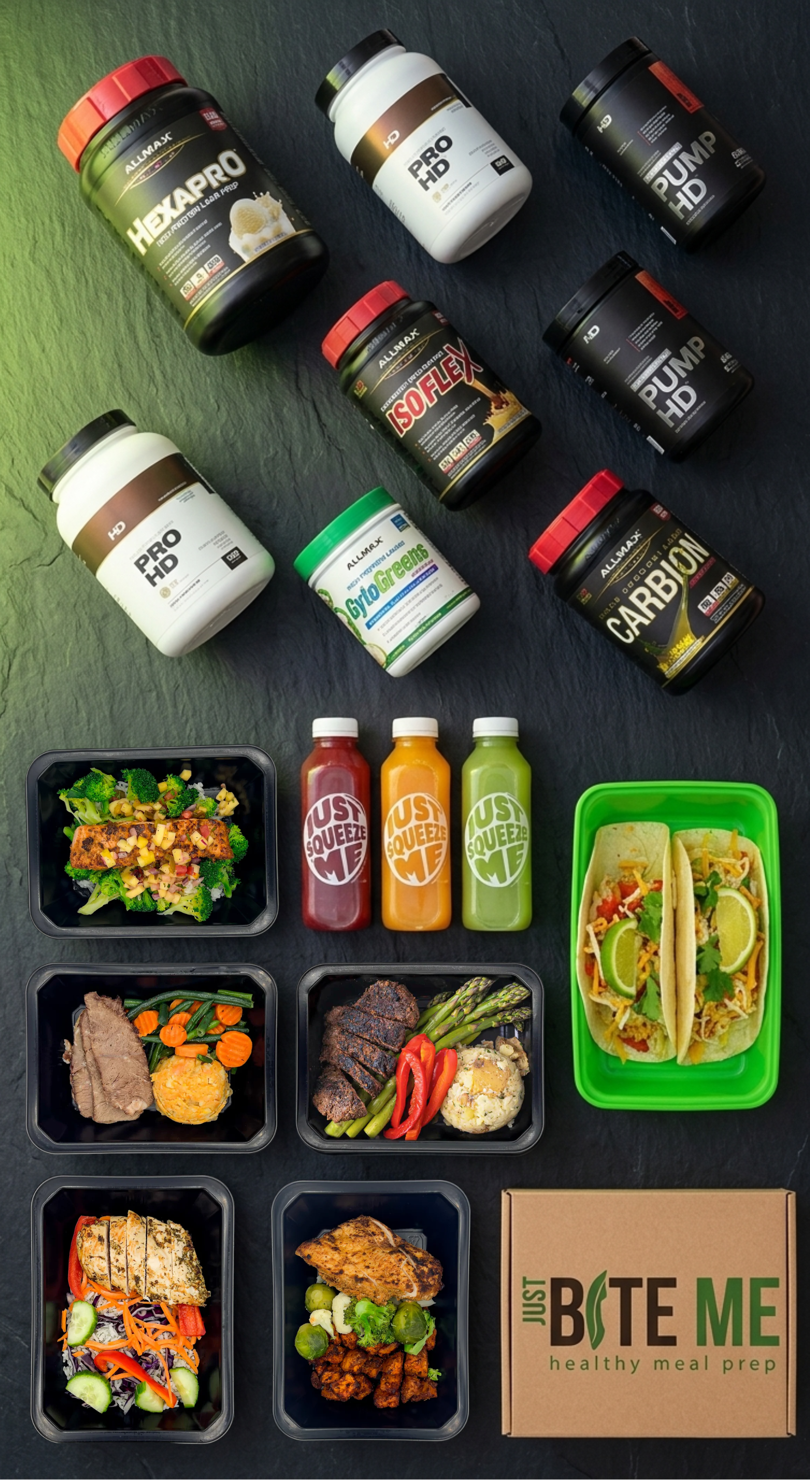 Overhead flat-lay of Just Bite Me Meals chef-prepared meal containers, AllMax and HD supplements, and Just Squeeze Me juices included in the $10,000 Birthday Giveaway prize pack